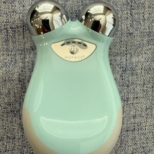 NuFace Mini Toning Device in Mint with Silver Accents